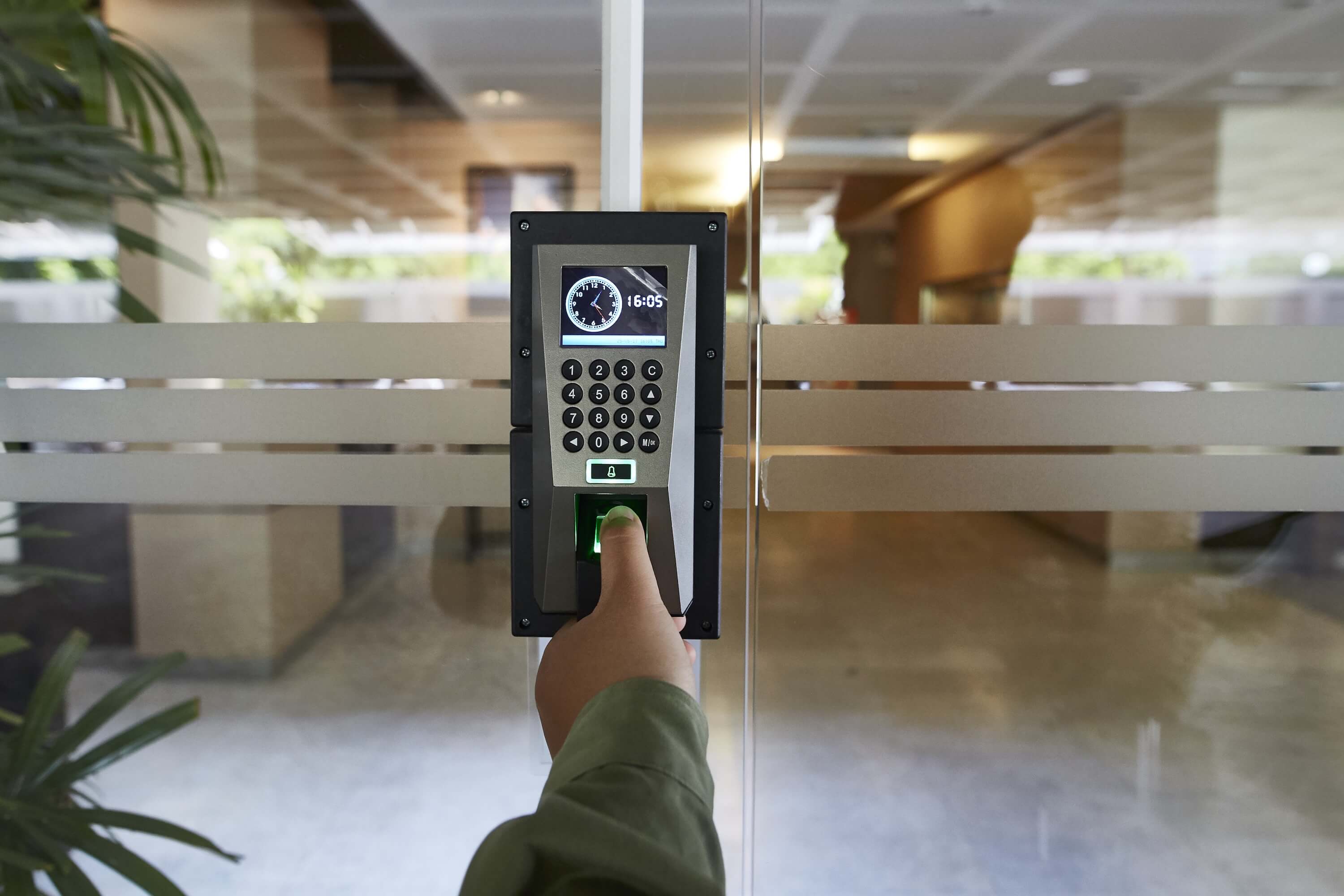 South African workers using biometric fingerprint time and attendance system for accurate payroll tracking